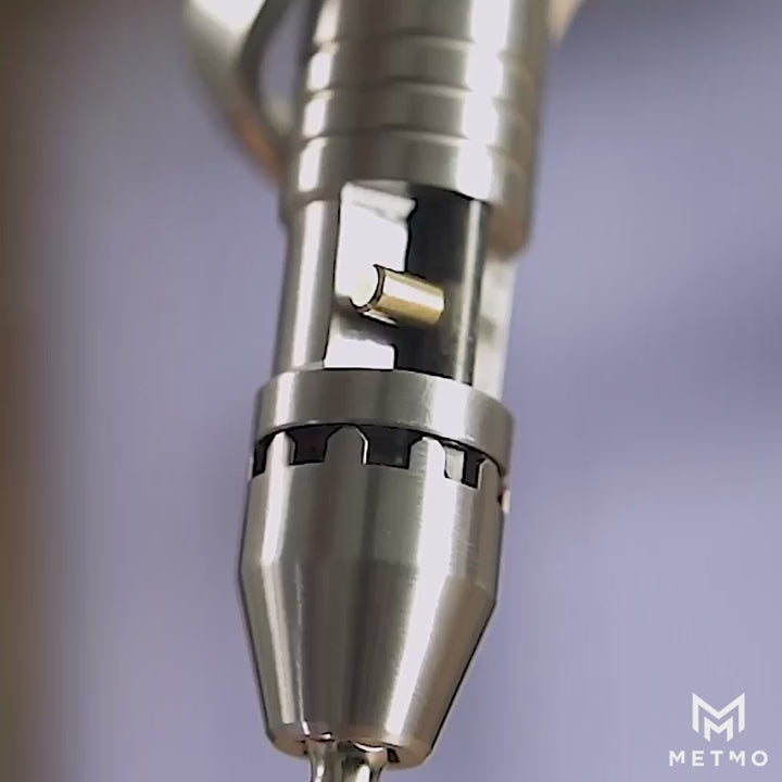 Load video: Close up silver Pocket Driver slowly spinning showing the visible ratchet mechanism