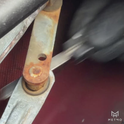 Pocket Grip multi tool fitted with a saw jaw used to saw a rusty car mechanism