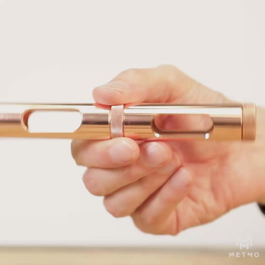 Metmo Eddy science desk toy showing a magnetic ball falling through the copper tube, creating an eddy current 