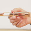 Metmo Eddy science desk toy showing a magnetic ball falling through the copper tube, creating an eddy current 
