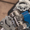 close up on the metmo fractal vise holding a variety of different objects to showcase its versatility