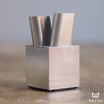 wire EDM metmo cube pins stuck up and slowy falling until they are flush inside the cube