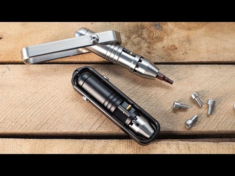 Two MetMo Pocket Drivers in different colours - Black Steel and Stainless Steel.